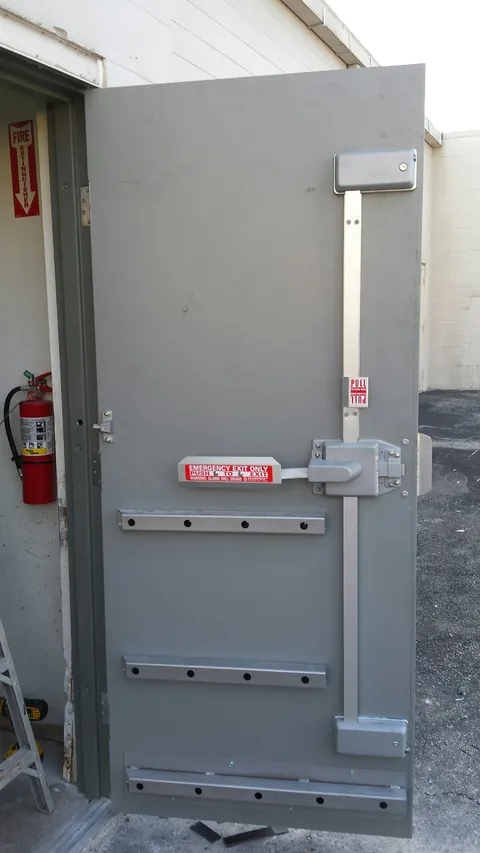 Image of the inside of a commercial steel emergency exit door