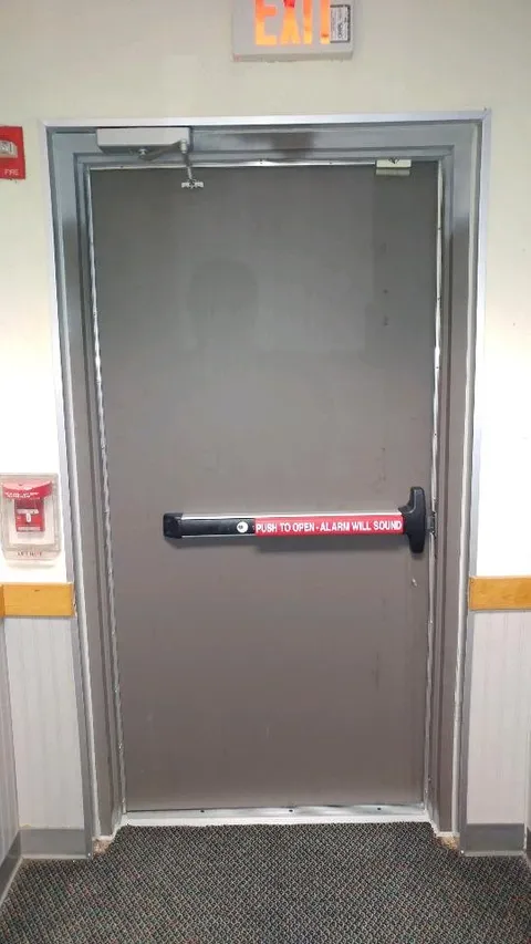 An emergency exit door installed by Perimeter Glass in Jacksonville, FL
