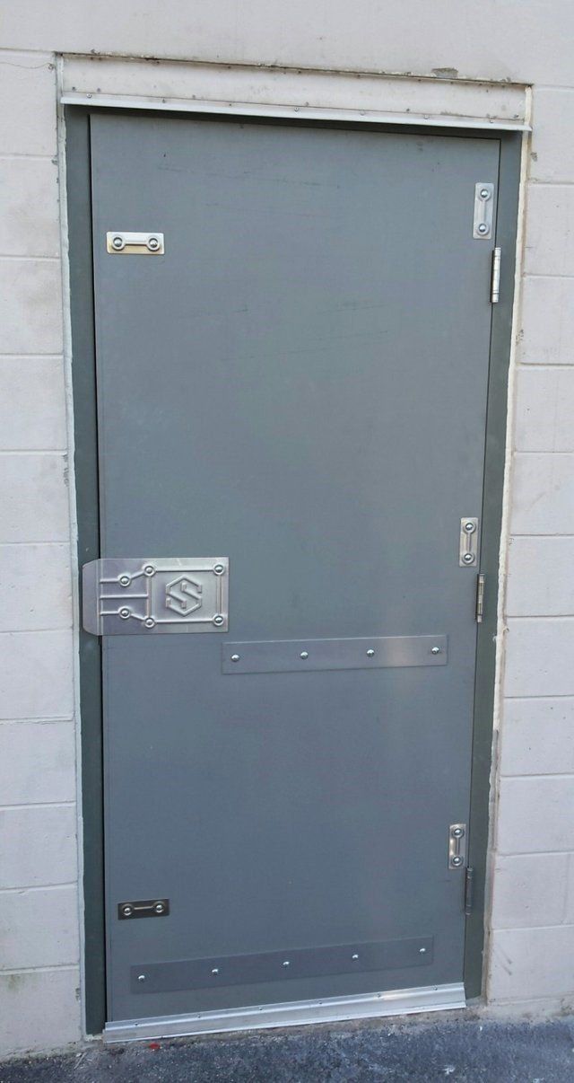 A durable steel door installed by Perimeter Glass in Jacksonville, FL